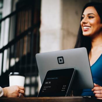 Women cashier smiling