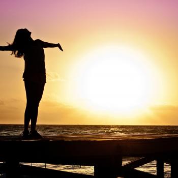 A women's shadow in front of sun rise